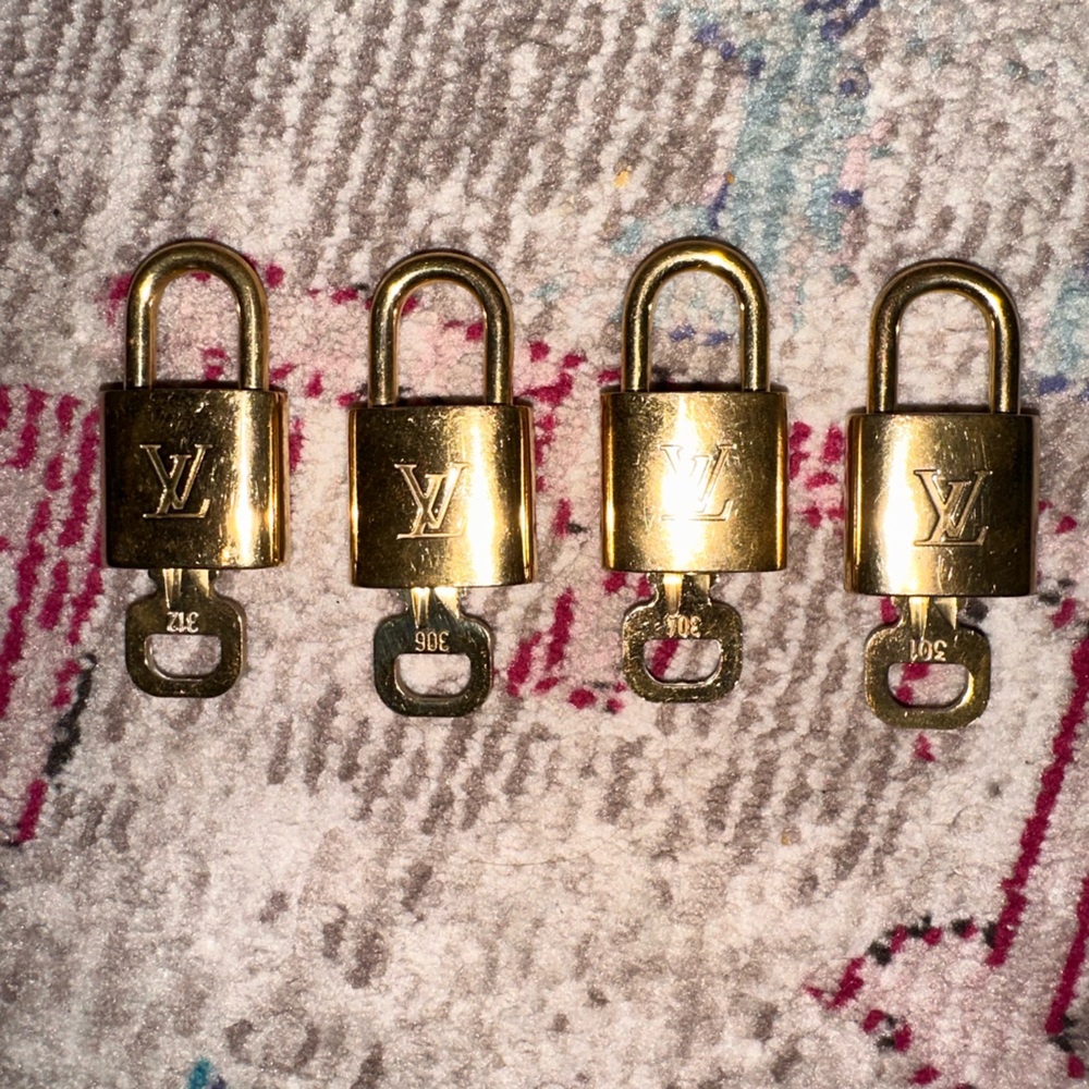Authentic Louis Vuitton Shiny Gold Lock